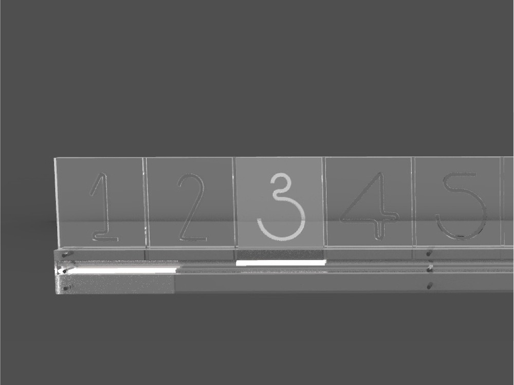 Lineárné hodiny z odpadové materiálu