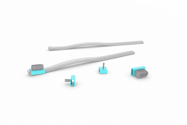 Kartáček na zuby s vyměnitelným nástavcem.